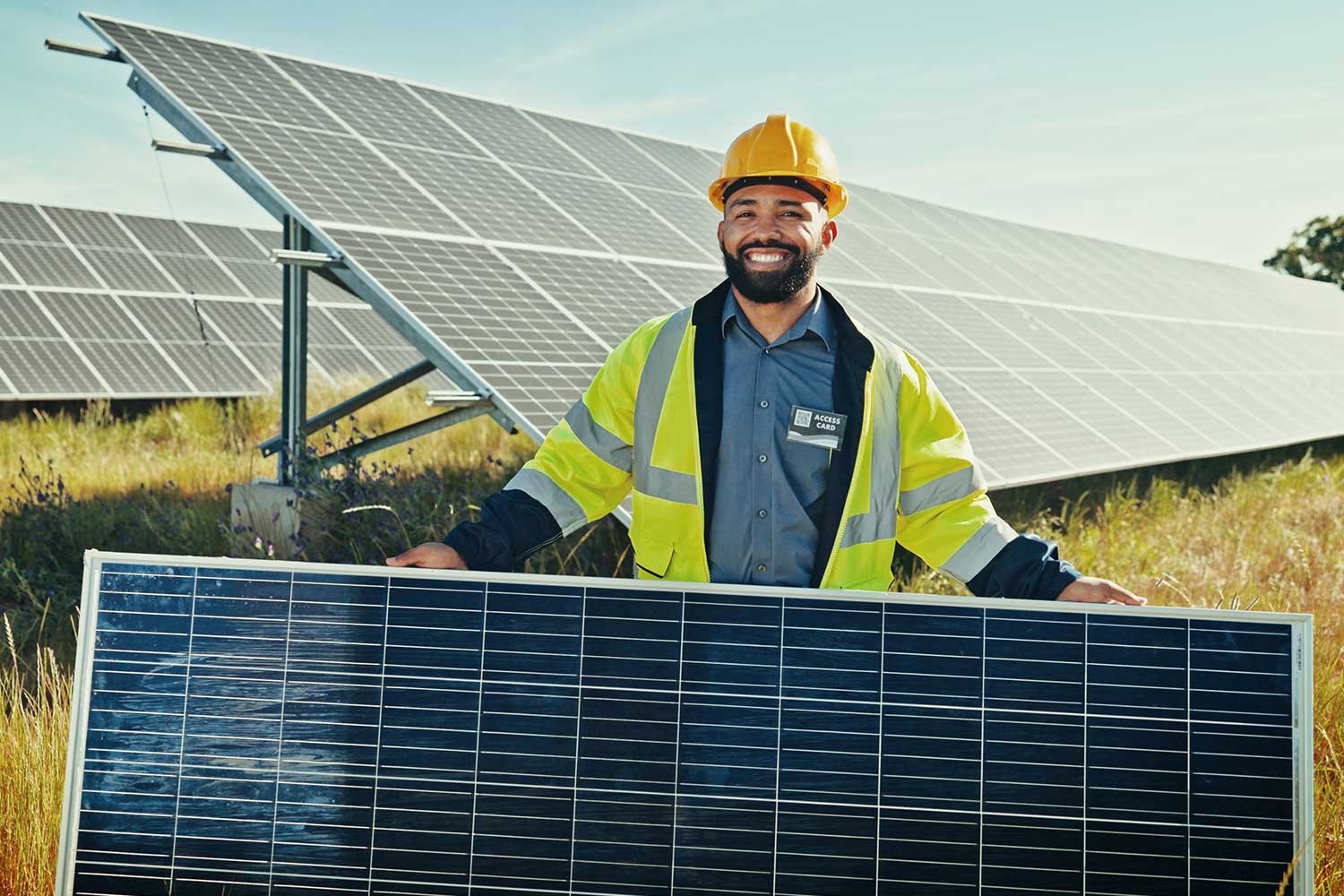 man-portrait-and-engineer-with-solar-panel-at-farm